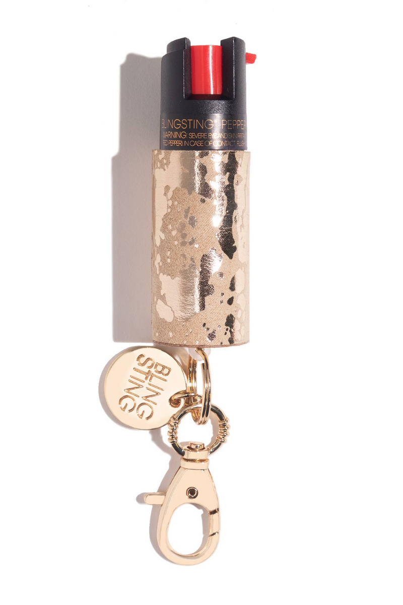 Blingsting Cowgirl Pepper Spray Cow Hide Print | Bella Lucca Boutique